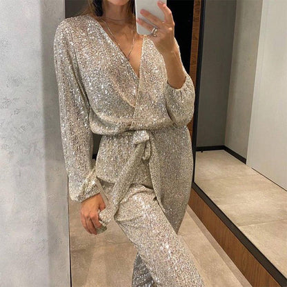 Glitzernde Damen Jumpsuit mit V-Ausschnitt und Gürtel